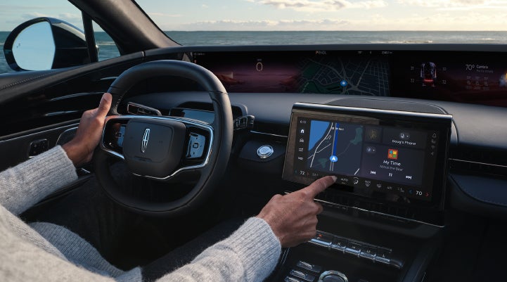 The driver of a 2024 Lincoln Nautilus® SUV interacts with the new Lincoln Digital Experience. | Capital Lincoln of Wilmington in Wilmington NC