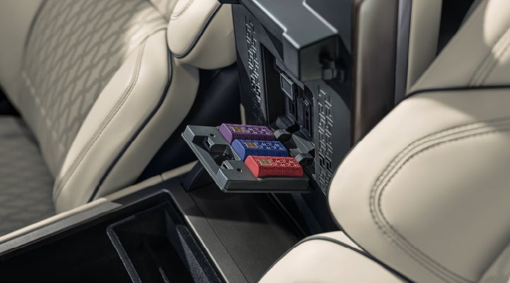 Digital Scent cartridges are shown in the diffuser located in the center arm rest. | Capital Lincoln of Wilmington in Wilmington NC
