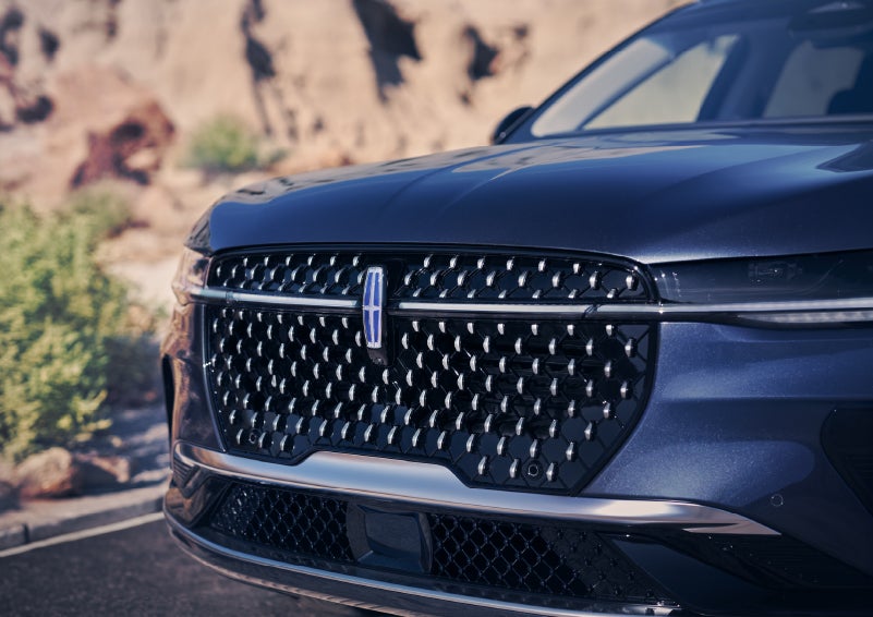 The stylish grille of a 2024 Lincoln Nautilus® SUV sparkles in the sunlight. | Capital Lincoln of Wilmington in Wilmington NC